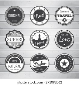 Vintage Labels template set: super, original, new, best choice, travel. Retro badges for your design on wooden background. Vector illustration. 