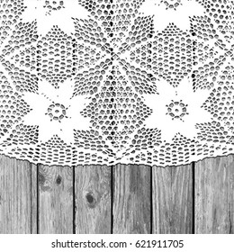 vintage lace napkin on wooden background