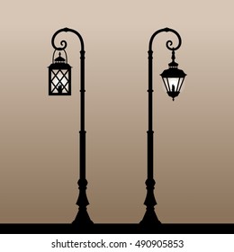 Vintage lanterns. Silhouette of an old lantern with a candle. Vector illustration.
