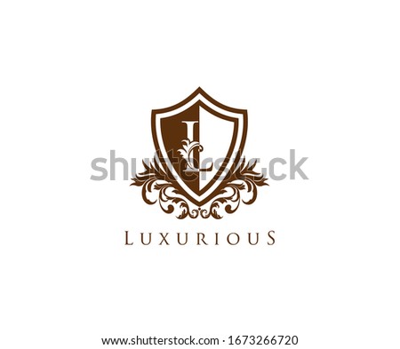 Vintage Letter L Logo. Shield L Letter Design Vector with shield shape and Floral Hand Drawn.