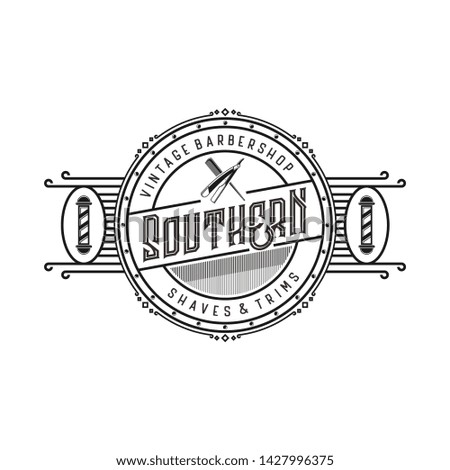 Vintage logo for barbershop with scissors elements and razor blades