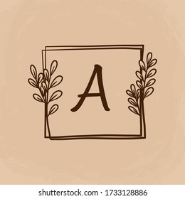 vintage A logo with leaves border and using hand drawn or doodle style