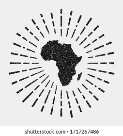 Vintage map of Africa. Grunge sunburst around the continent. Black Africa shape with sun rays on white background. Vector illustration.