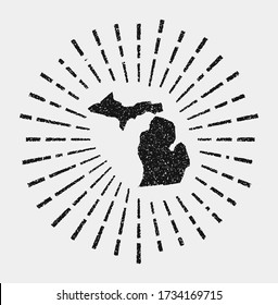 Vintage map of Michigan. Grunge sunburst around the US state. Black Michigan shape with sun rays on white background. Vector illustration.