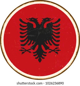 Vintage Metal Sign - Round Albania Flag - Vector EPS10. Grunge scratches and stain effects can be easily removed for a cleaner look.