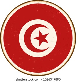 Vintage Metal Sign - Round Tunisia Flag - Vector EPS10. Grunge scratches and stain effects can be easily removed for a cleaner look.