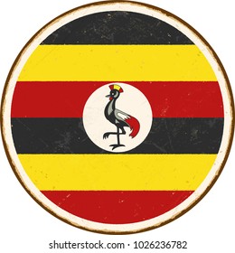 Vintage Metal Sign - Round Uganda Flag - Vector EPS10. Grunge scratches and stain effects can be easily removed for a cleaner look.