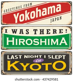 Vintage metal signs collection with Japan cities. Travel souvenirs on grunge damaged background. Yokohama, Hiroshima and Kyoto.