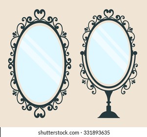 vintage mirror with a handle and  mirror on a background 