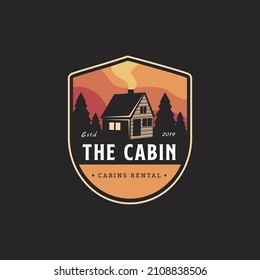 Vintage modern outdoor emblem with forest view and cabin house in forest logo icon vector, cottage hut cabin logo template on dark background