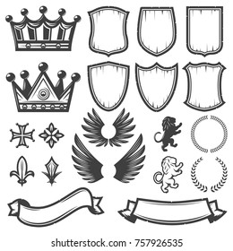 Vintage monochrome heraldic elements collection with crowns shields wings lions ribbons laurel wreaths swords crest isolated vector illustration