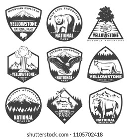 Vintage monochrome national park labels set with inscriptions rare animals trees mountains exploding geyser isolated vector illustration