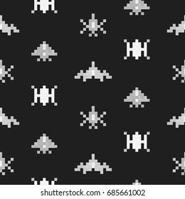 Vintage monochrome pixel art background. Seamless pattern of vector pixel spaceships. Retro video games icons on black background. Digital design 80th.