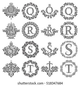 Vintage monograms set of letters Q, R, S, T. Heraldic coats of arms, symbols in floral round frames.