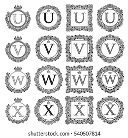 Vintage monograms set of U, V, W, X letter. Heraldic coats of arms in wreaths, round and square frames. Black symbols on white.