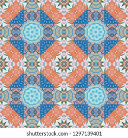 Vintage mosaics. Vector illustration. Seamless pattern in blue, beige and orange colors. Ethnic motif.