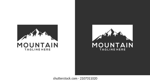 Vintage mountain vector logo design and illustration on black and white background.