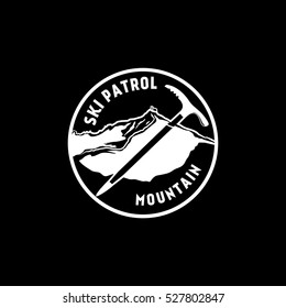 Vintage mountaineering and arctic expeditions logos, badges, emblems and design elements. Vector illustration. Ice pickaxe sign