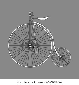 Vintage old bike. Graphic vector illustration. The illustration on gray background.