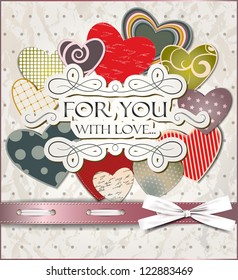 Vintage old paper card with hearts and silk ribbon