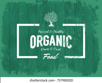 Vintage organic, natural and healthy food vector logo isolated on wood board background. Premium quality green and fresh products grunge logotype emblem illustration. Superior signboard retro design.