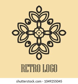 Vintage ornamental logo monogram. Retro luxury logotype for design with swirl elements