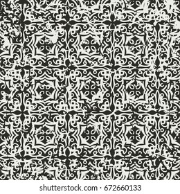 Vintage ornamental seamless textured pattern with grunge scratched effect . Element for design.