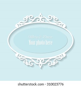 Vintage oval frame on light blue.