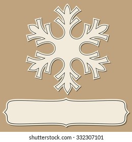 Vintage paper empty frame with snowflakes over brown backgrounds.