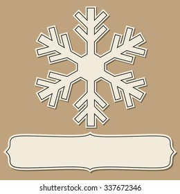 Vintage paper empty frame with snowflakes over brown backgrounds.