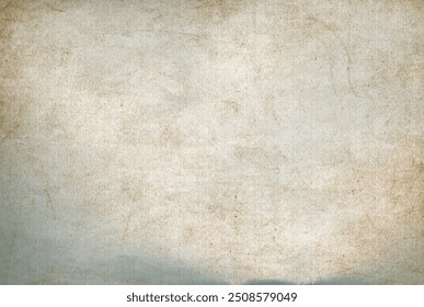 Vintage paper texture. Old worn damaged shabby parchment sheet