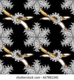 Vintage pattern on black background with golden elements.