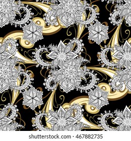 Vintage pattern on black background with golden elements.