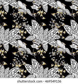 Vintage pattern on black background with golden elements.