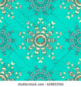 Vintage pattern on blue background with golden elements. Christmas, snowflake, new year.