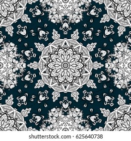Vintage pattern on blue background with golden elements. Christmas, snowflake, new year.