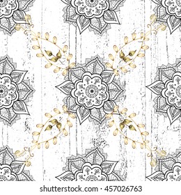 Vintage pattern on white background with golden elements.