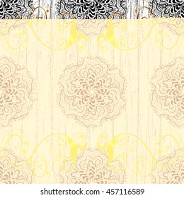 Vintage pattern on white rough background with golden elements.