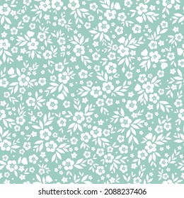 Vintage pattern. Small white flowers and leaves. light green background. Seamless vector template for design and fashion prints.