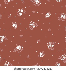 Patrón vintage. flores blancas pequeñas, hojas y puntos. fondo marrón. Plantilla vectorial perfecta para impresiones de diseño y moda.