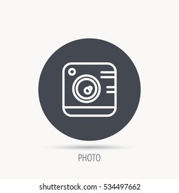 Vintage photo camera icon. Photography sign. Professional studio equipment symbol. Round web button with flat icon. Vector
