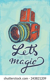 Vintage photo camera with "Let's make some magic" slogan