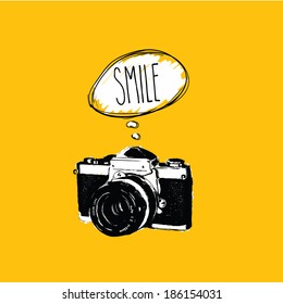 Vintage photo camera says 'SMILE' vector design