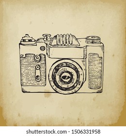 Vintage photo camera vector sketch illustration. Hand draw retro photographer camera on old paper background.