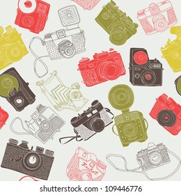 vintage photo cameras. seamless pattern