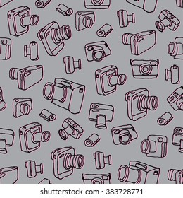 Vintage photo cameras. Seamless pattern. Hand drawn vector illustration.
