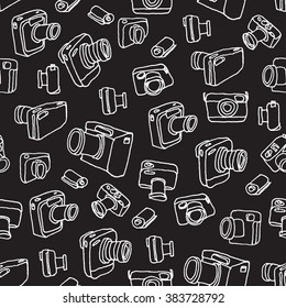 Vintage photo cameras. Seamless pattern. Hand drawn vector illustration.