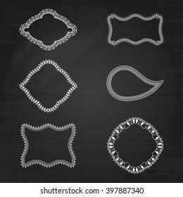 Vintage photo frame in doodle style on chalkboard background