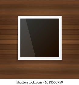 vintage photo frame with shadow isolated on wooden wall background. Vector Photo realistic Mockups with empty space for photo. old photo icon