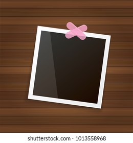 vintage photo frame with shadow isolated on wooden wall background. Vector Photo realistic Mockups with empty space for photo. old photo icon
